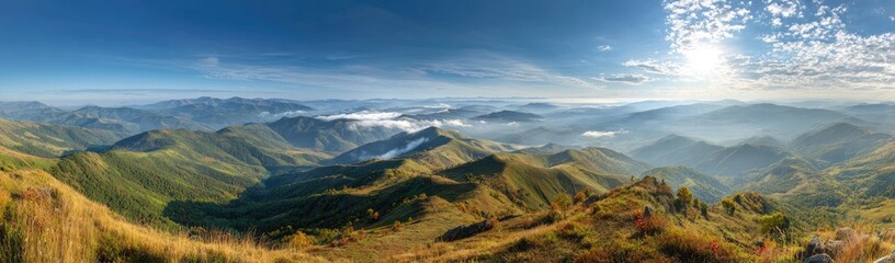 Panoramic mountain vista with valleys and clouds