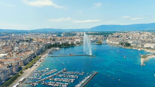 Geneva, Switzerland. Fountain Je-Deau. Large fountain jet up to 140 meters. The main attraction of Lake Geneva. Summer day. Drone footage, Point of interest