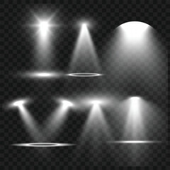Realistic White Stage Spotlights and Light Beam Effects Set on Transparent Background. Vector