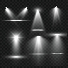 Realistic White Stage Spotlights and Light Beam Effects Set on Transparent Background. Vector