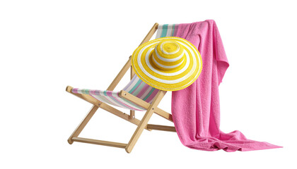 A striped deck chair, hat, and pink towel against a black backdrop