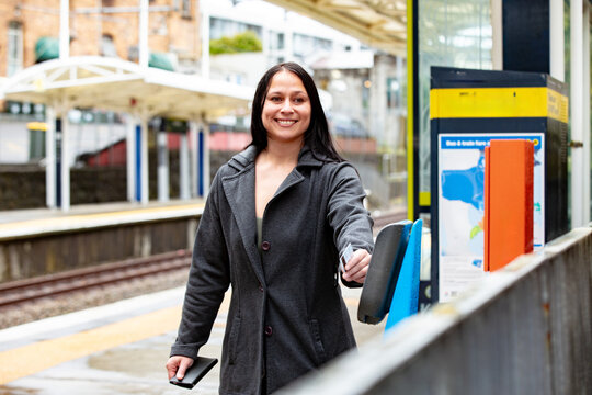 Maori woman on a suburban train platform in Auckland