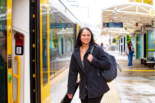 Maori woman on a suburban train platform in Auckland