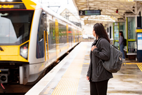 Maori woman on a suburban train platform in Auckland
