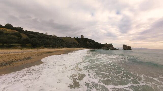 Aerial Fpv Drone Clip, Flying Close to Waves in Folia Beach near Apollonia Tower in Kavala Coast Greece
