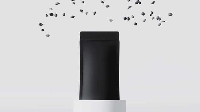 Black pouch on a white pedestal with falling coffee beans