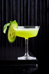 Refreshing Green Gin Cocktail with Cucumber Ribbon and Clear Ice
