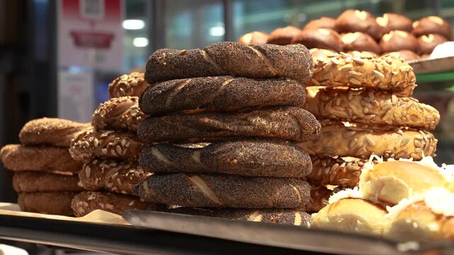 Piles of freshly baked simit bagels in a bakery in Istanbul, Turkey