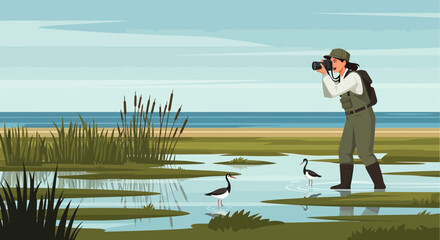 Naklejka premium Man observing birds in wetland habitat with binoculars