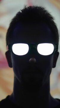 Real life anime protagonist with glowing eyeglasses walk into frame