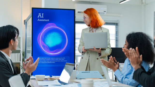 Diverse creative team use Ai Assistant (artificial intelligence assistant) on AI-assisted display for Marketing Data Analyst meeting at office.Coding team,develop Ai Assistant,business brainstorming