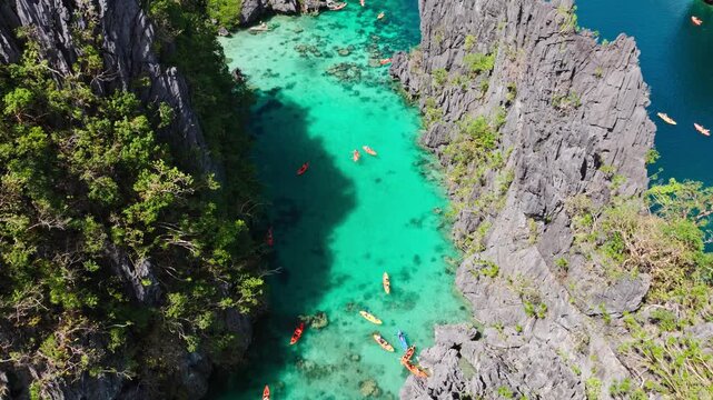 Descending aerial motion exposes crystal lagoon scale silence, tropical harmony