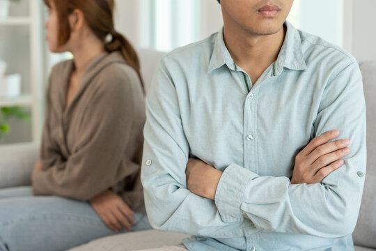 Divorce. Asian couples are desperate and disappointed after marriage. Husband and wife are sad, upset and frustrated after quarrels. distrust, love problems, betrayals. family problem, teenage love