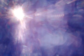 Blue blur bokeh  effects abstract wallpaper with lens flare , sun light bokeh effects 