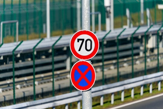 Close-up of traffic signs near the Frankfurt Airport at German city of Neu-Isenburg on a sunny autumn day. Photo taken November 22nd, 2025, Zeppelinheim, Germany.