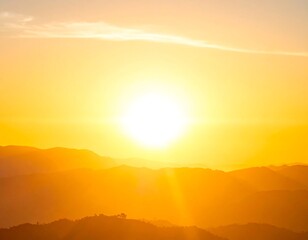 Obraz premium Golden sunrise over rolling hills, with bright sunburst and warm yellow hues