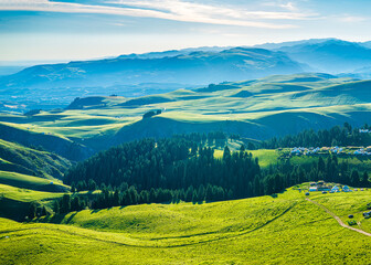 Aerial view of the beautiful rolling green mountain and meadow with forest natural landscape in...