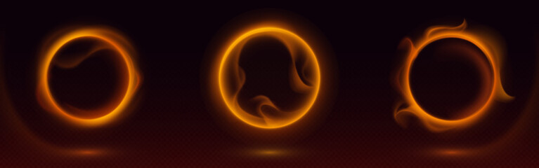 Naklejka premium Abstract fire rings glowing on black background with smoke or haze. Vector realistic illustration of round frames with burning flame effect, hot circles shimmering in darkness, magic portal