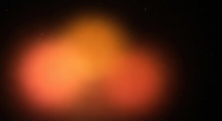 Abstract red and orange light spots with film grain and dust on black surface
