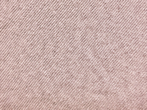 soft beige knit fabric texture closeup radiating cozy warmth with intricate weave patterns in neutral earthy tones
