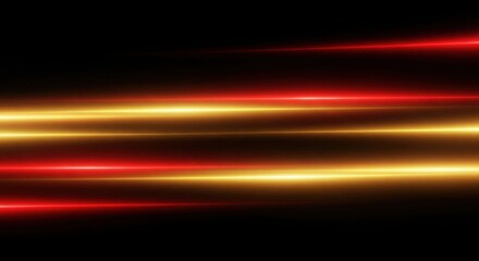 Bright red and yellow light streaks with glowing effect on black background