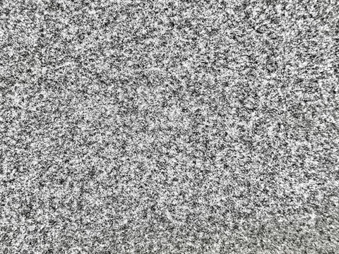 chaotic tv static noise texture monochrome grayscale abstract pattern evoking digital interference retro screen glitch vintage broadcast signal loss