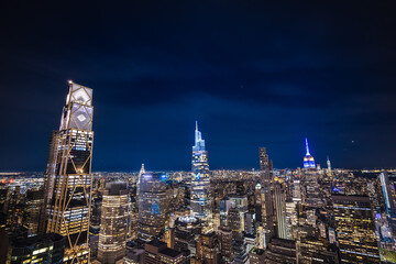 Night aerial view of illuminated Manhattan skyscrapers