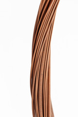 Strings of a musical instrument different sizes, background music. Close up detail of the string of an acoustic guitar, piano on a white background.