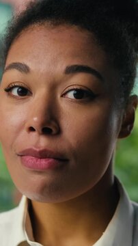 Sad upset African American business woman female girl showing brain explosion overwhelmed businesswoman brainstorm difficulty looking at camera in downtown lady head boom gesture overload overworked