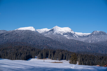 Snow-covered Buckelwiesen near Mittenwald set within the winter alpine mountains.