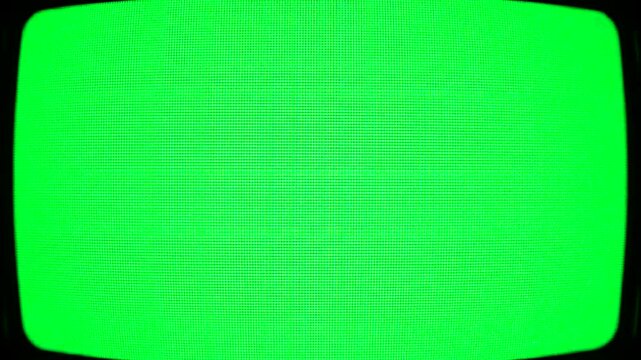 Vibrant green screen with rounded edges on a black background.