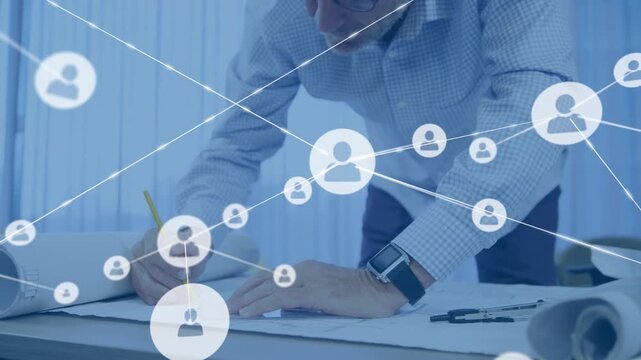 Animation of network of connections with icons over male caucasian architect