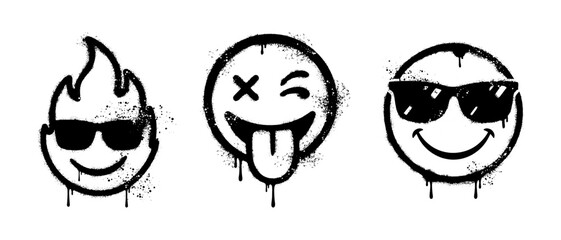 Urban graffiti spray paint emoji smiley face set with dripping texture © HENI