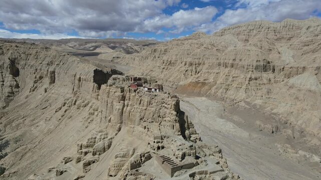 Aerial Drone Orbit Around Ancient Guge Kingdom Ruins and Earth Forest Canyon, Tibet, China
