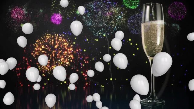 Animation of champagne glass and happy new year text over flying balloons and multicolored fireworks