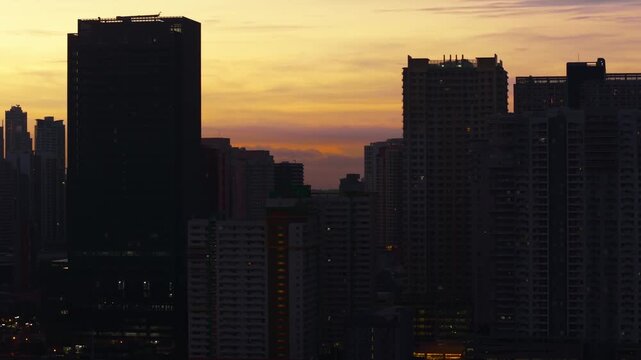 Dawn light over Makati skyscrapers mirrors balance in modern multipolar world
