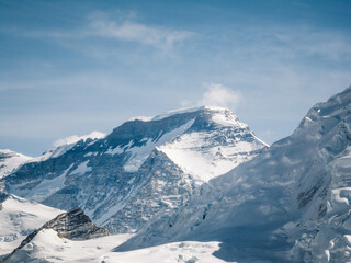 Aerial view of beautiful glacier in high altitude mountains landscape