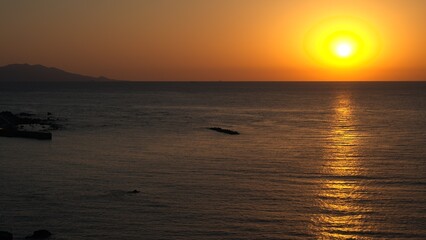 Obraz premium 海からの日の出