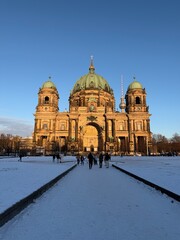 Berlin Cathedral at sunset with snow covered foreground © Janica