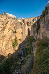 Fototapeta premium View of Puente Nuevo New Bridge and Tajo de Ronda gorge in Ronda at sunny day, Andalusia, Spain. Travel destination.