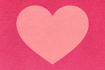 Fototapeta premium Pink heart on fuchsia paper texture background with copy space for Valentines Day banner, template or greeting card