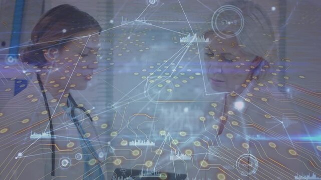 Animation of network of connections with icons over doctors desk with mouse and stethoscope
