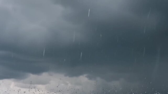 Dark Stormy Clouds with Heavy Rainfall.