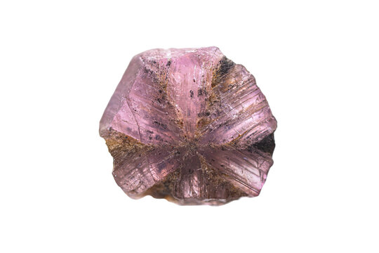 Closeup rare natural rough trapiche pink sapphire on white background (rare variety of corundum gemstone group)(selective focus) 