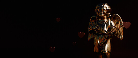 Romantic Golden Cupid Statue Red Hearts Background
