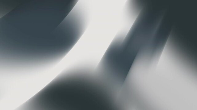 silver metallic background animation featuring rotating light-filled shapes with smooth reflective gradients. The dynamic rotation and luminous surfaces create a futuristic and high-end visual style.