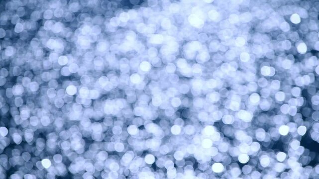 Blurry sea glows under soft light. Ocean bokeh sparkles quietly. Glowing water feels smooth and calm. Blurred waves shine gently. Sea light creates dreamy bokeh. Soft glow rests on the ocean.