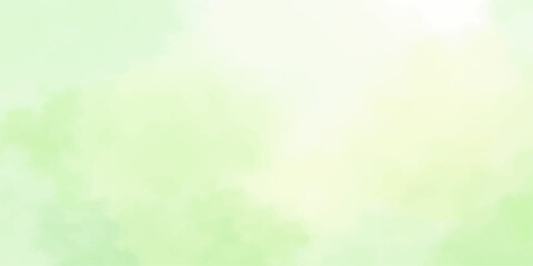 A vibrant abstract green background with soft bokeh patterns features a bright nature design blending spring colors and light textures for a colorful summer wallpaper © lima