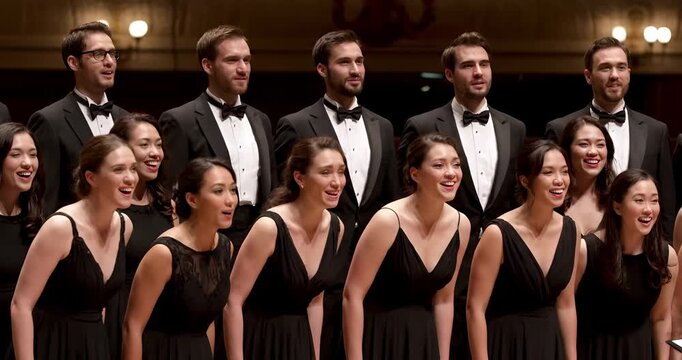 Professional choir group singing together on stage