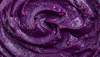 Fototapeta premium Dark purple blueberry jam or puree swirl texture macro top view